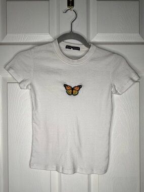 Brandy Melville White Tee with Orange Butterfly Patch one size